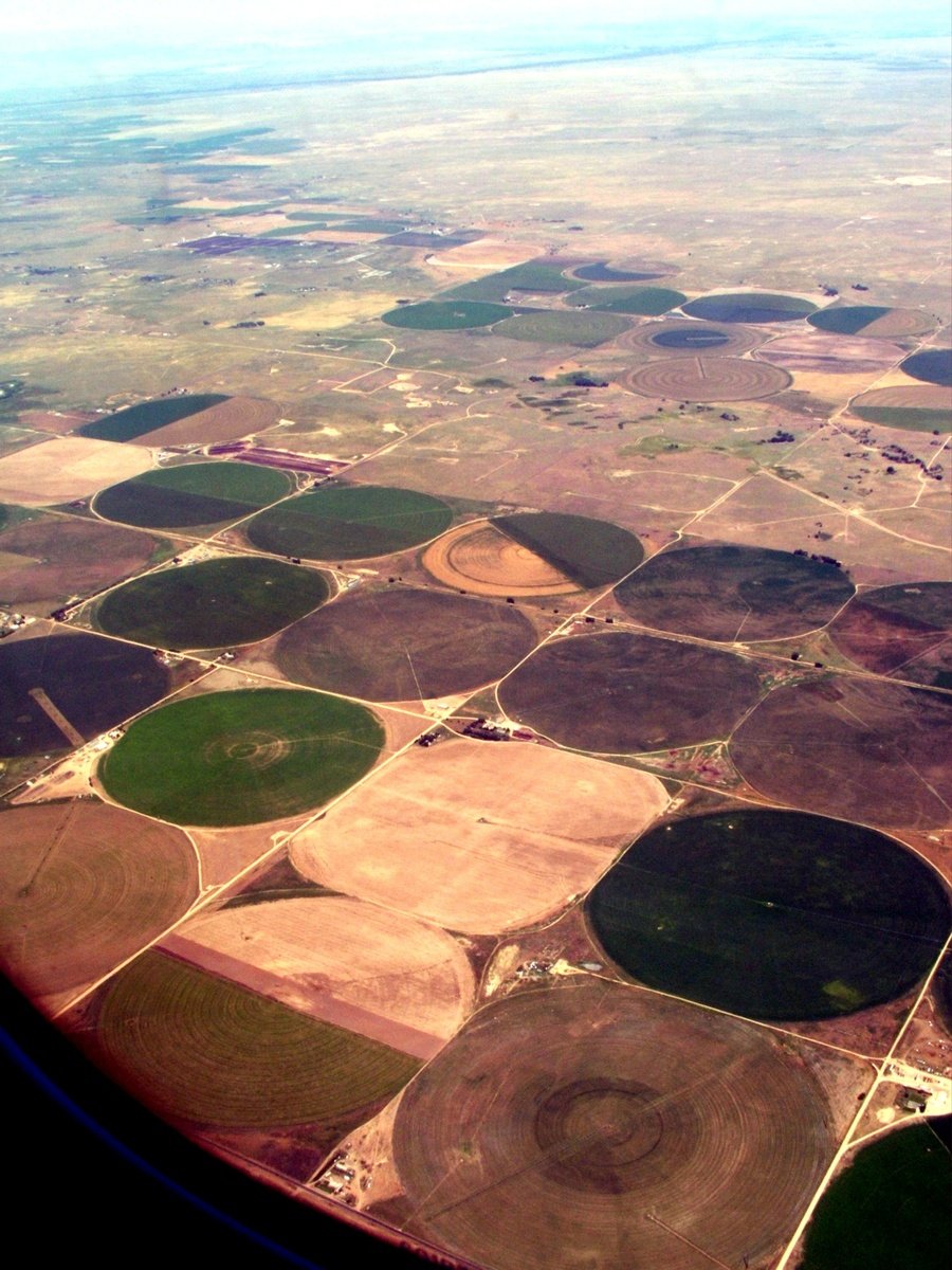 an image of view of a field from an airplane