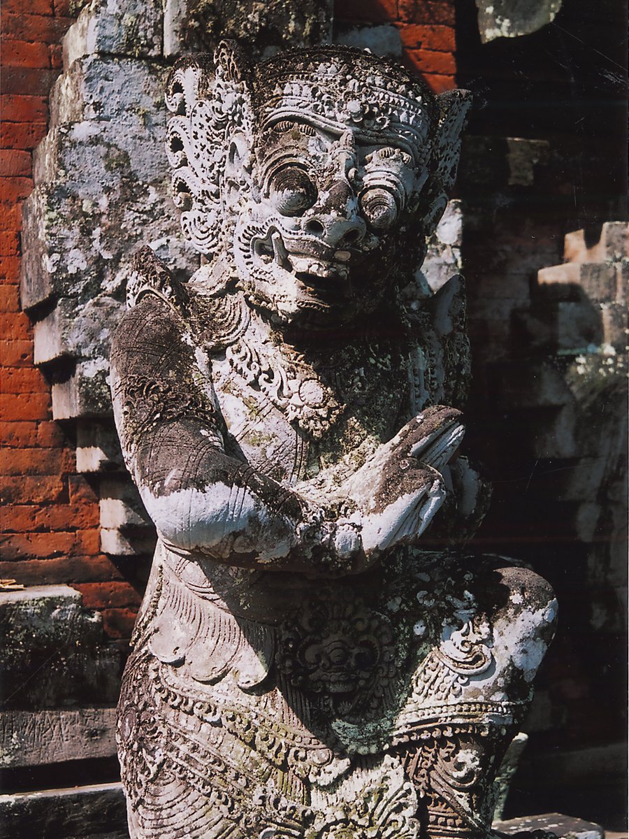 a statue made from stone of a lion