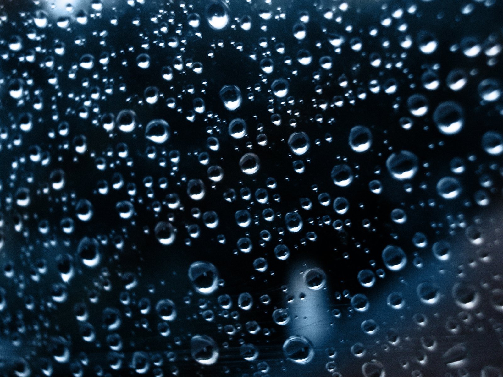 the background of rain drops of water on a window