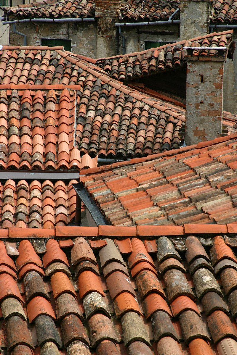 red tiled roofs that are in a row