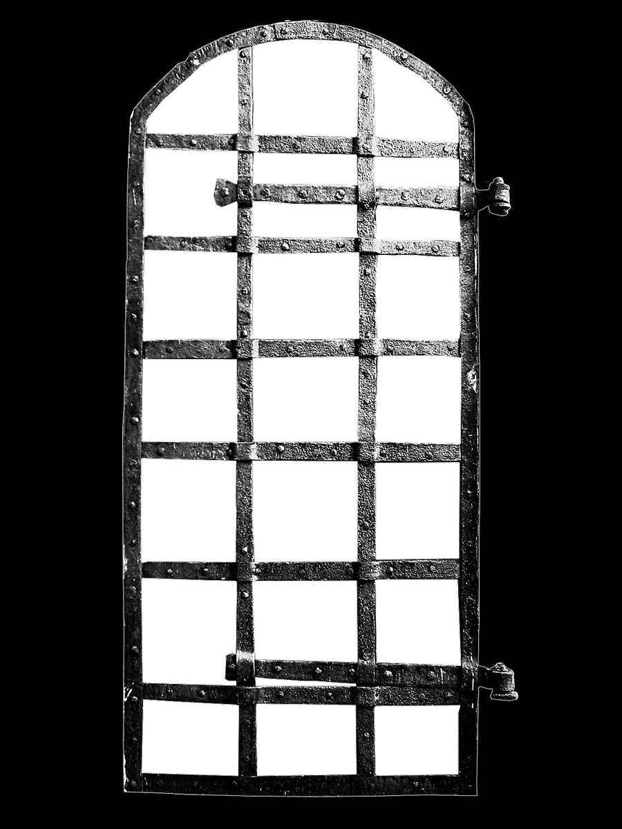 the back of a door with a wrought iron design on it