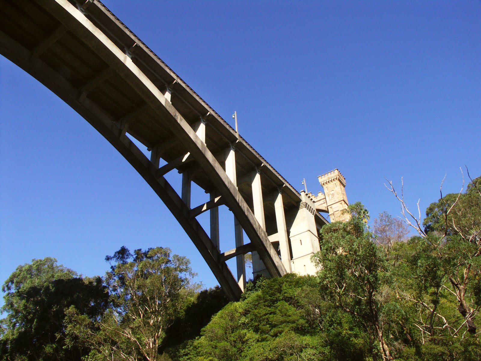 an old bridge that runs over the water