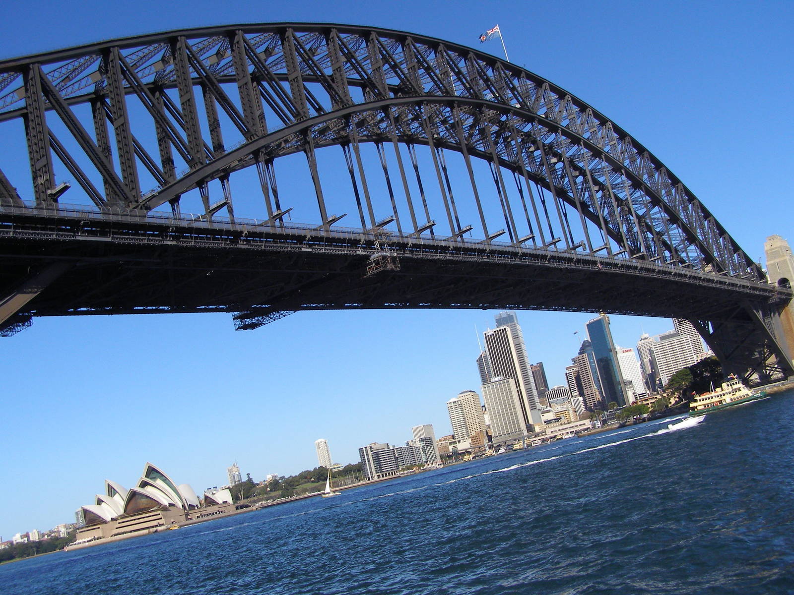 a bridge that leads to the city across water