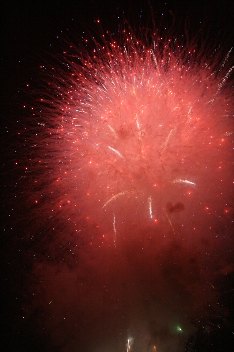 fireworks are shown in the dark sky with bright colors