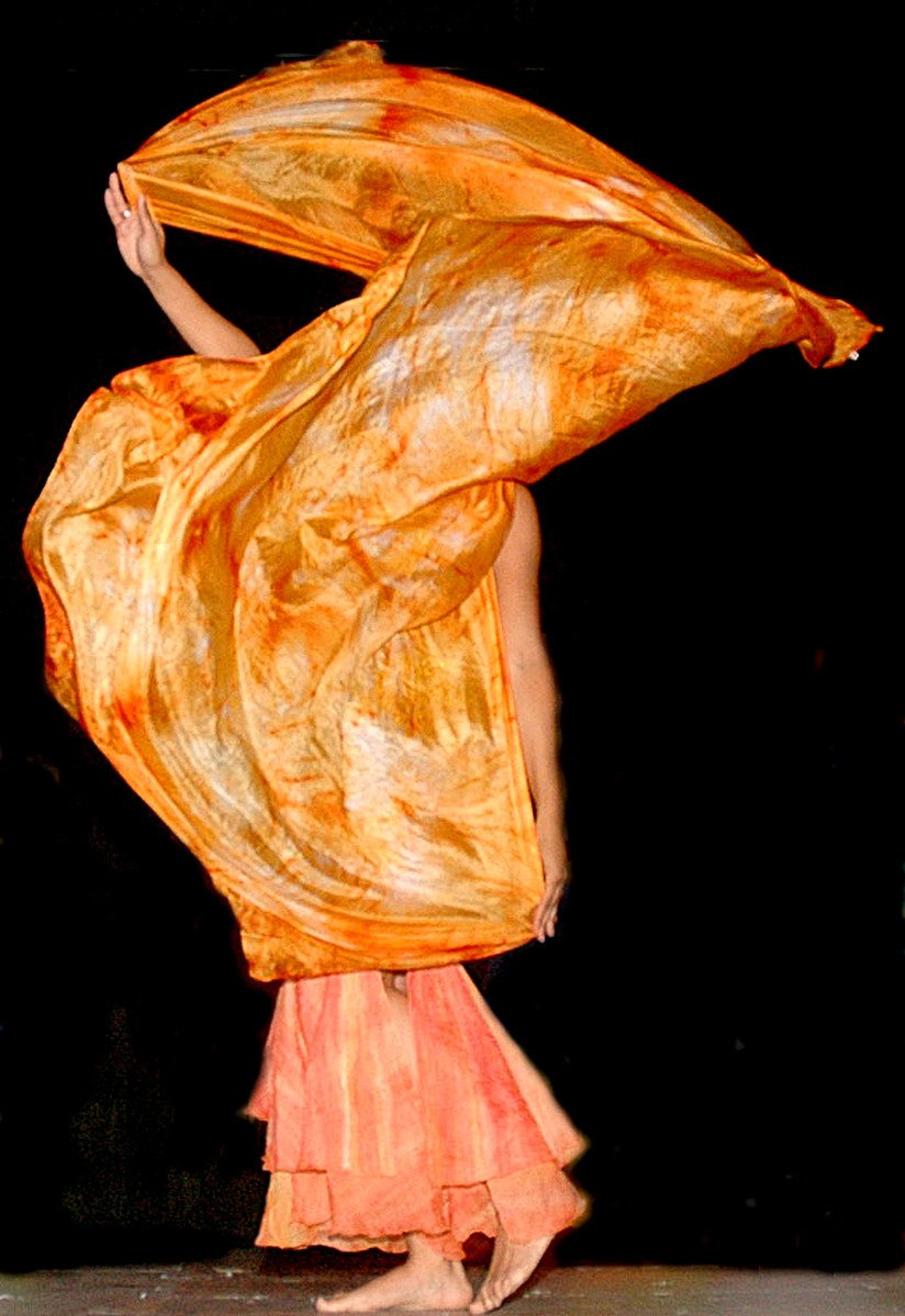 an image of a woman in orange dress