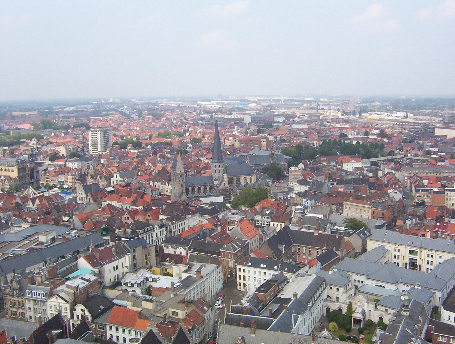 an overhead view of old town with many colorful rooftops