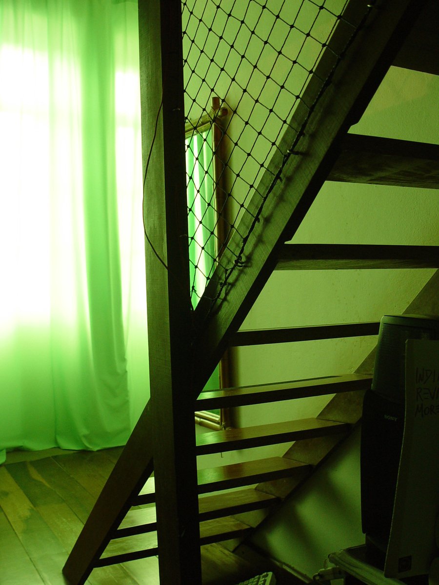 a staircase that leads to the bottom floor of a home