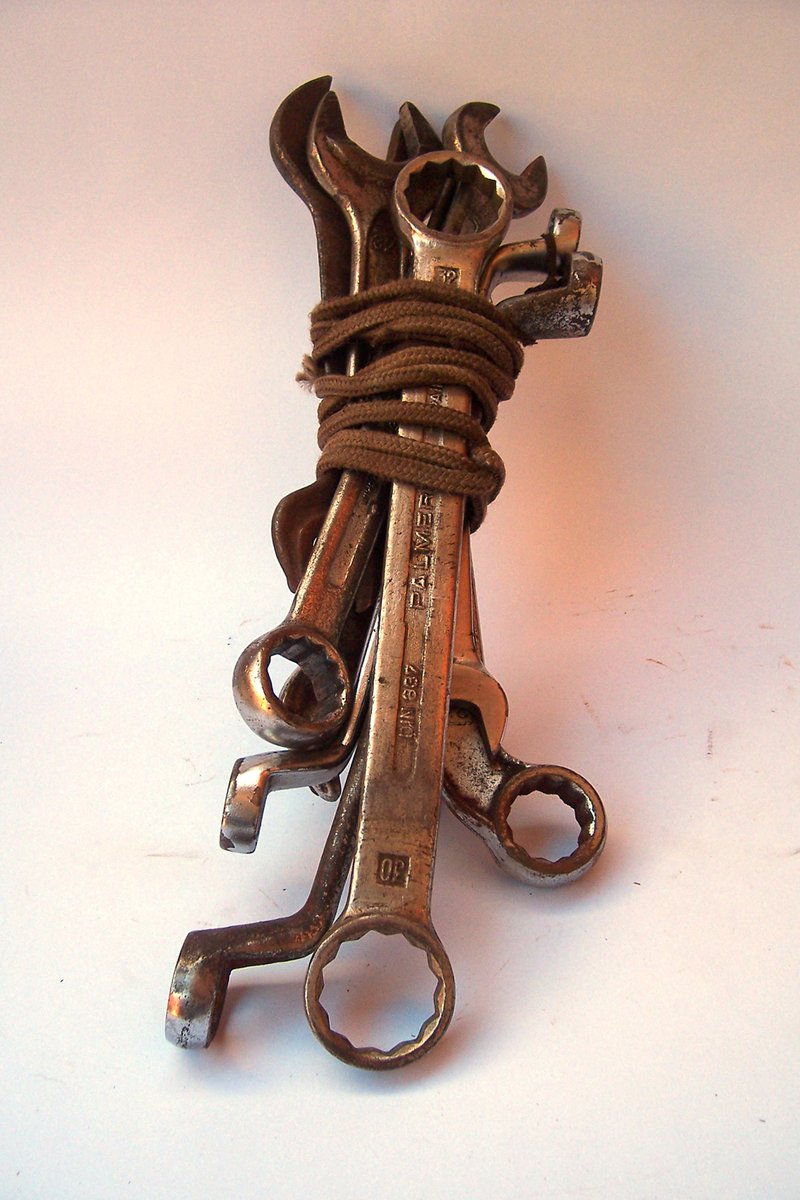 three pairs of keys attached to a rope