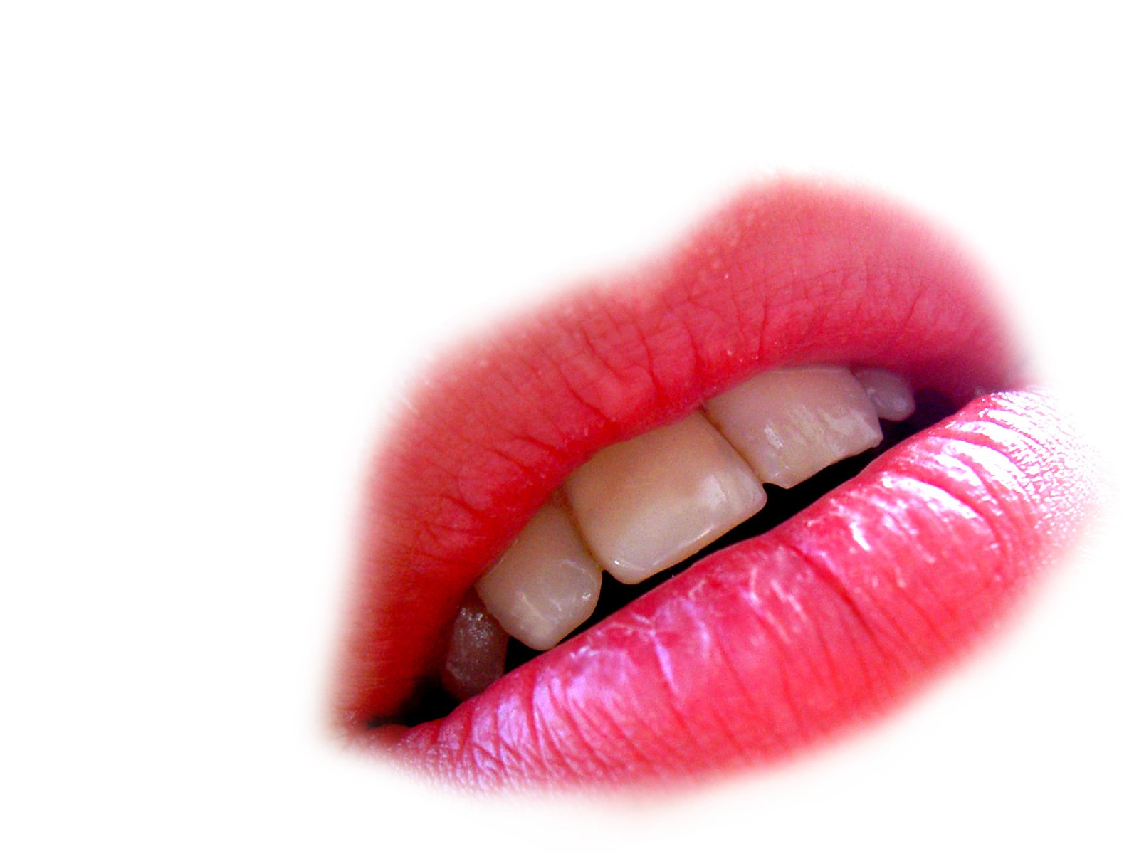 a close up image of a woman's lips and lip ring