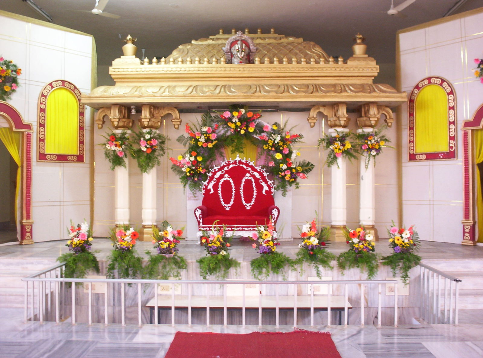 an old mandap with floral decorations on top