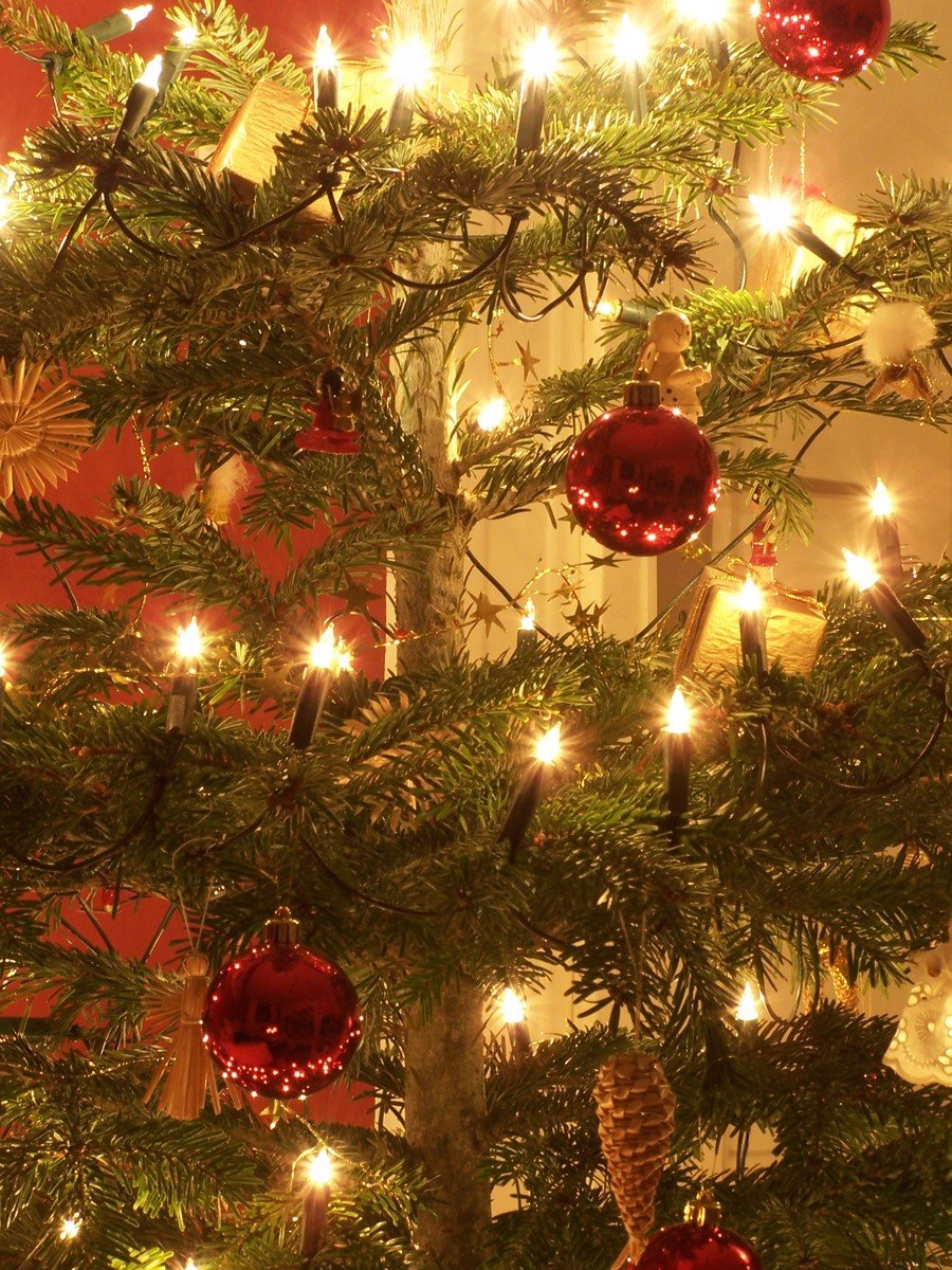 a christmas tree is decorated with christmas balls