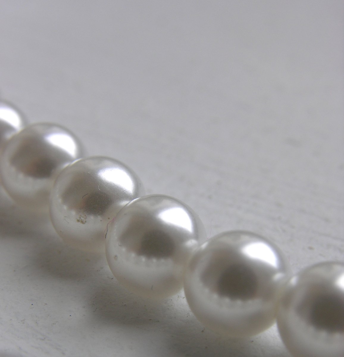 an image of a beaded white necklace