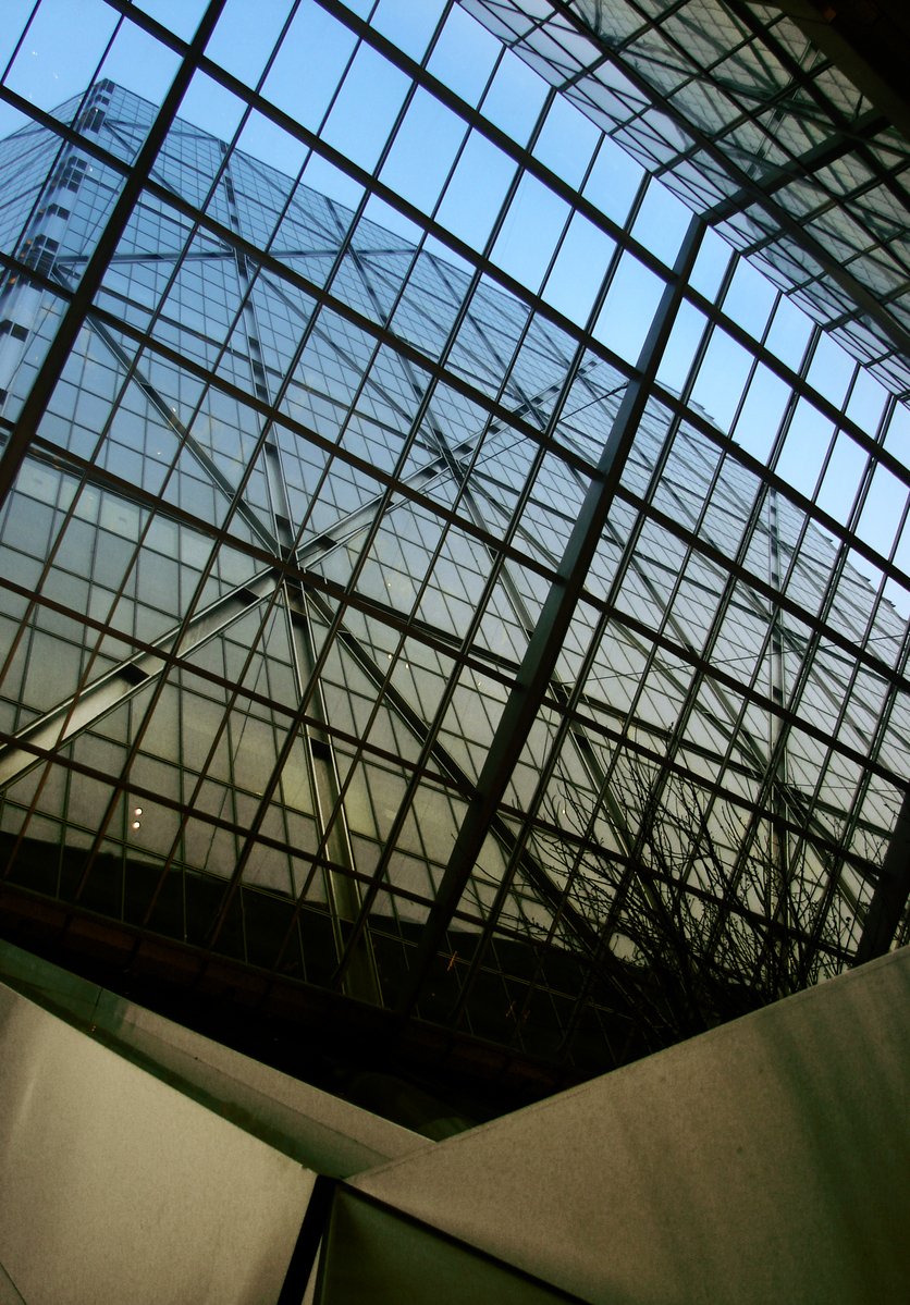 a close up of a glass roof with windows