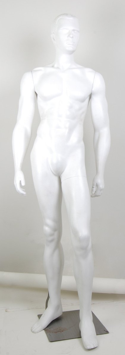 white dummy sculpture standing in front of a white background