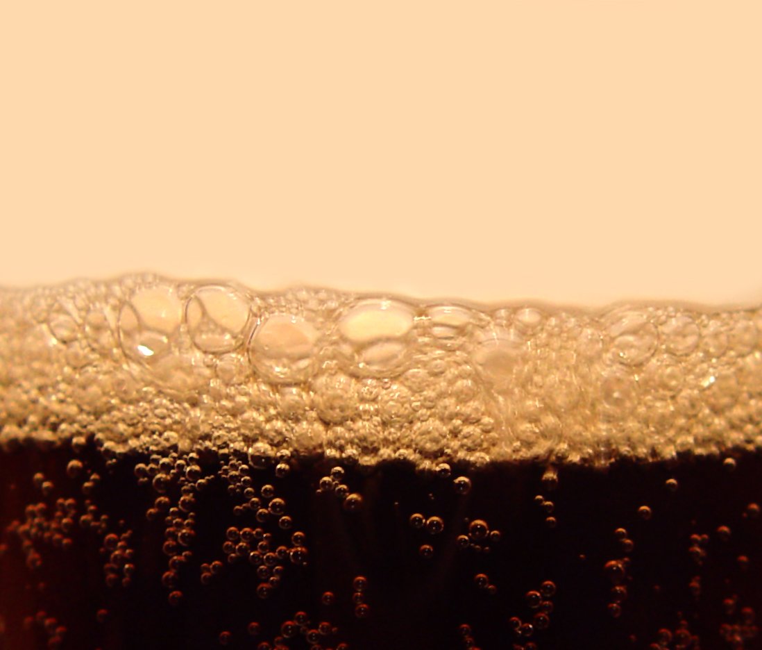 bubbles in the beer are visible in this close up po