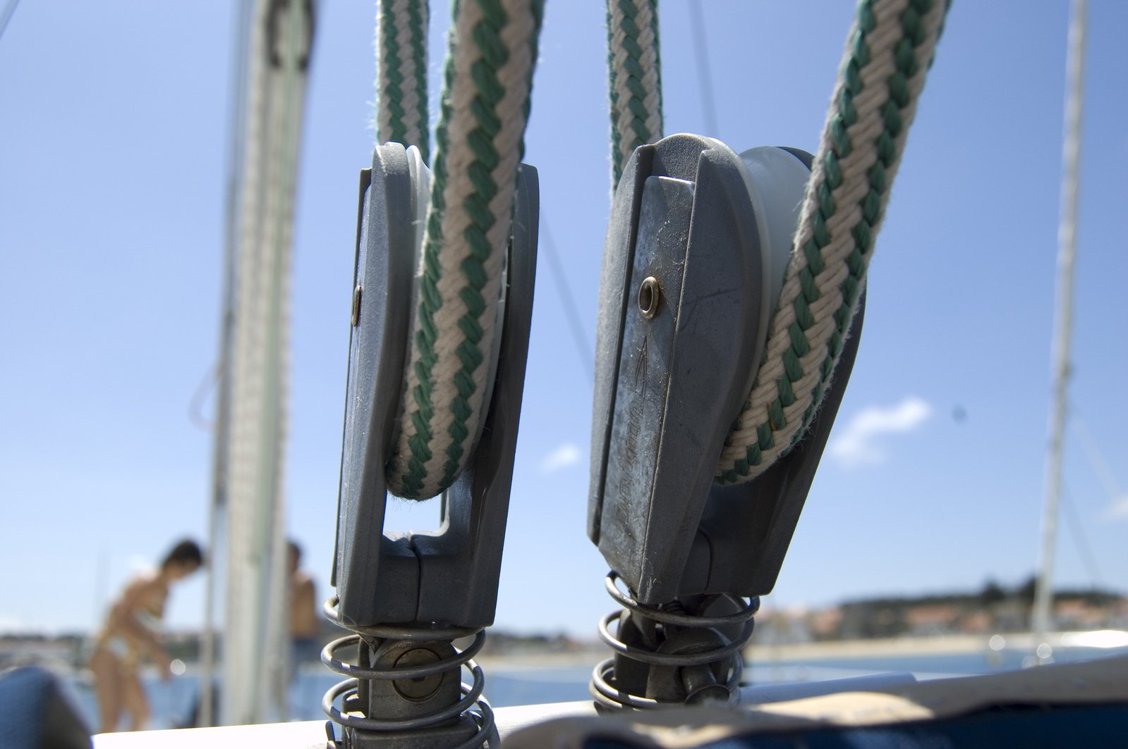 the ropes on a boat hang from each end