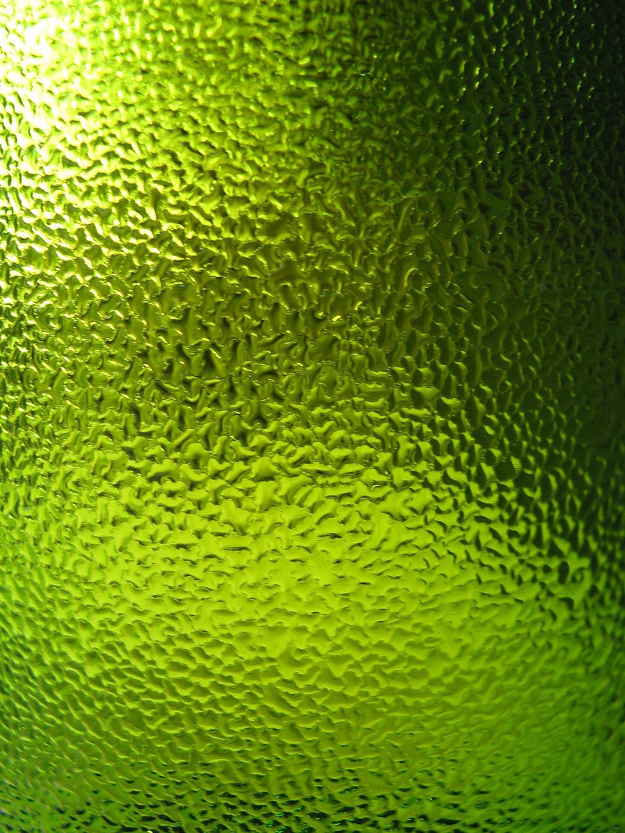 an image of green textured glass with light