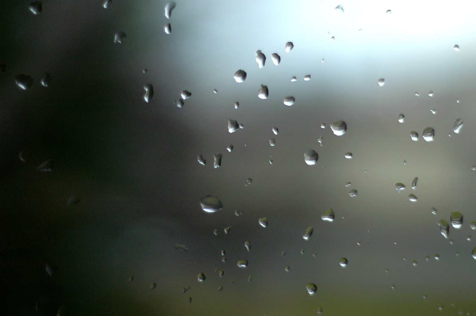 a view of rain drops on the window