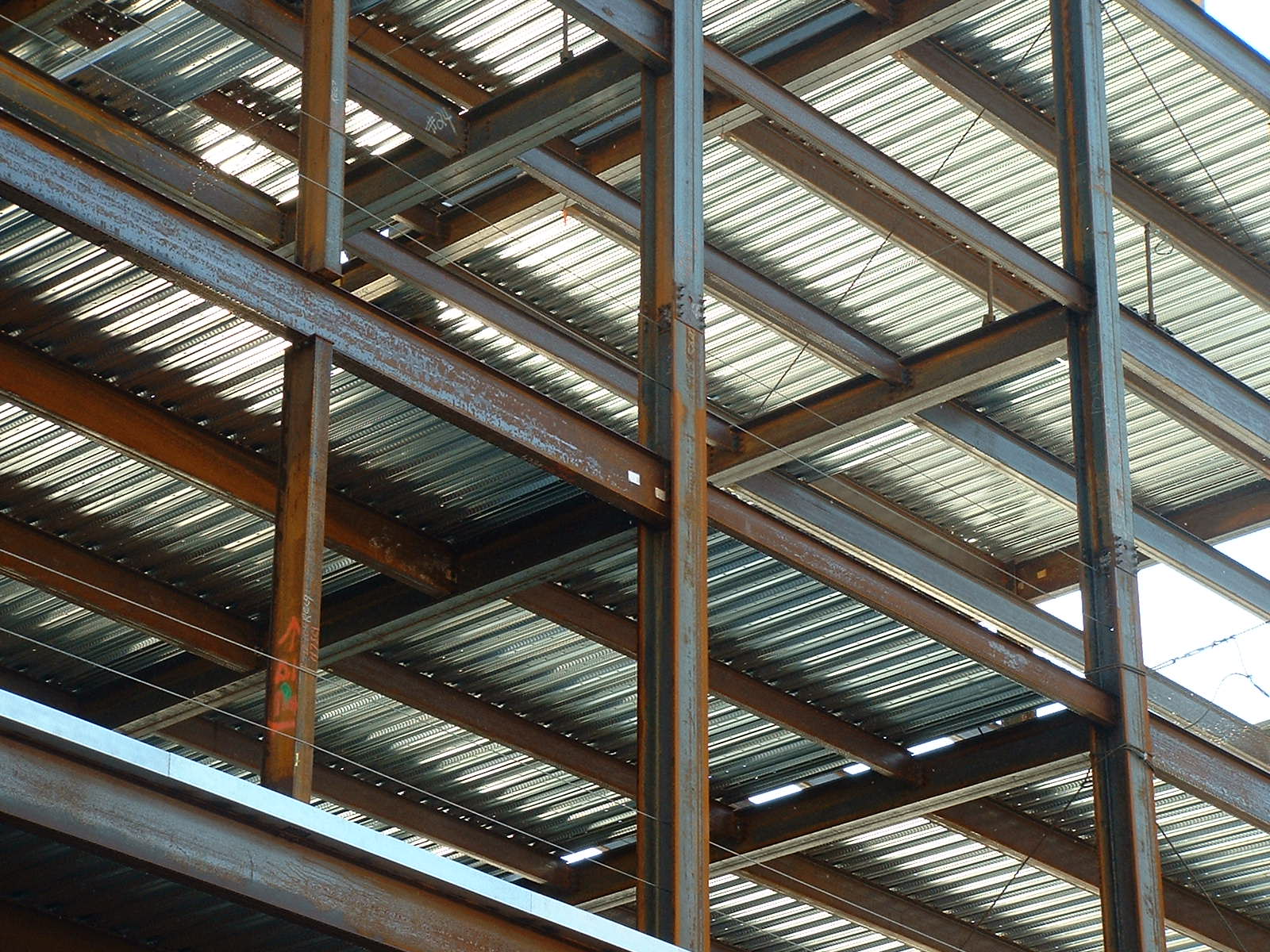 a metal structure with many beams sticking out of it