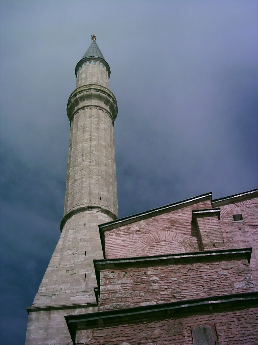 a building with a tower with a clock