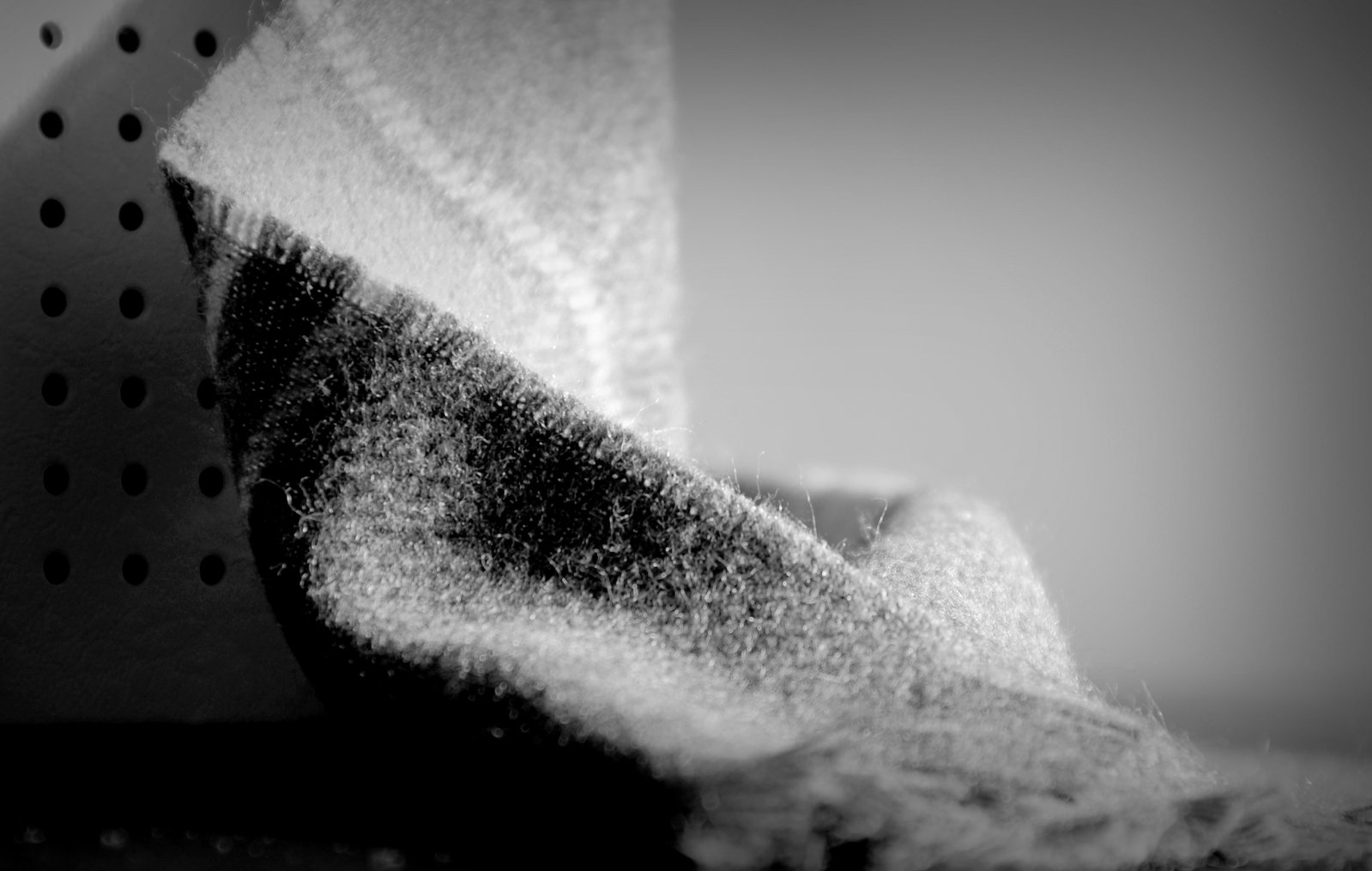 black and white image of a pile of fabric