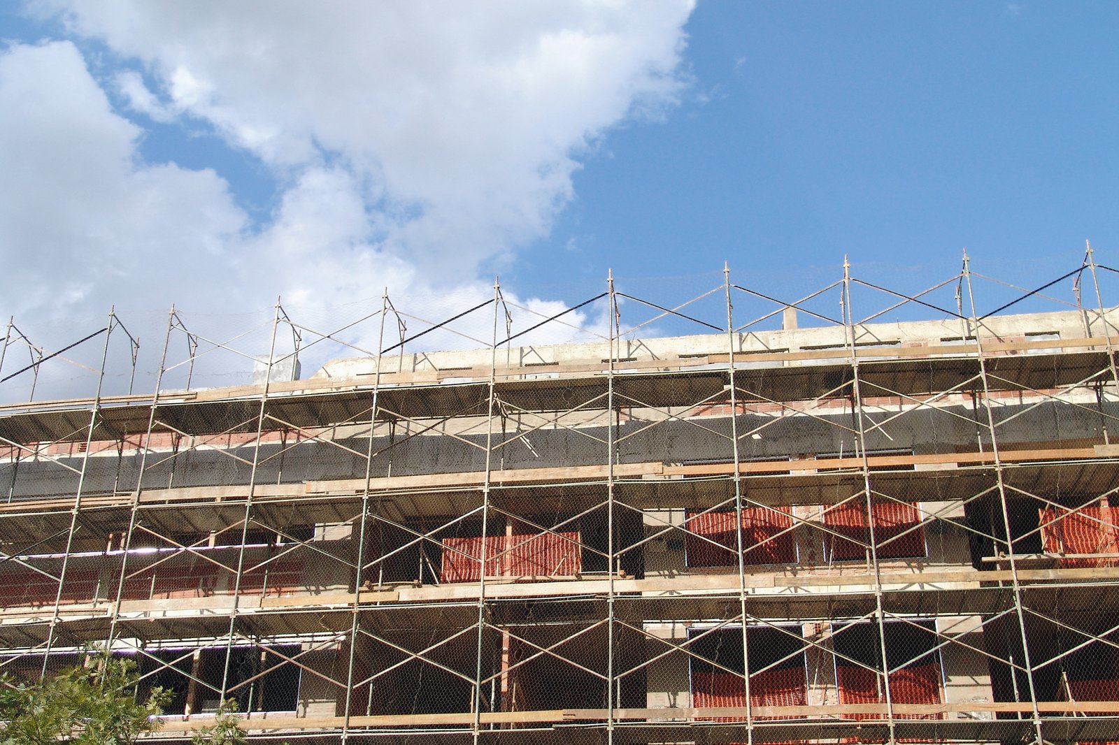 there is an old building covered in scaffolding