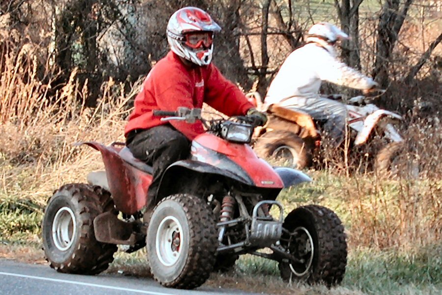 a person is riding on a four wheeler