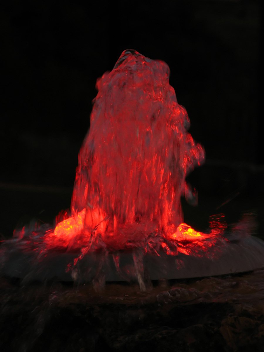 a close up of a water spewing device