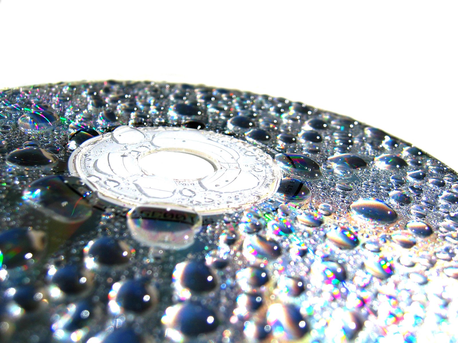 the disc is reflecting water droplets on it