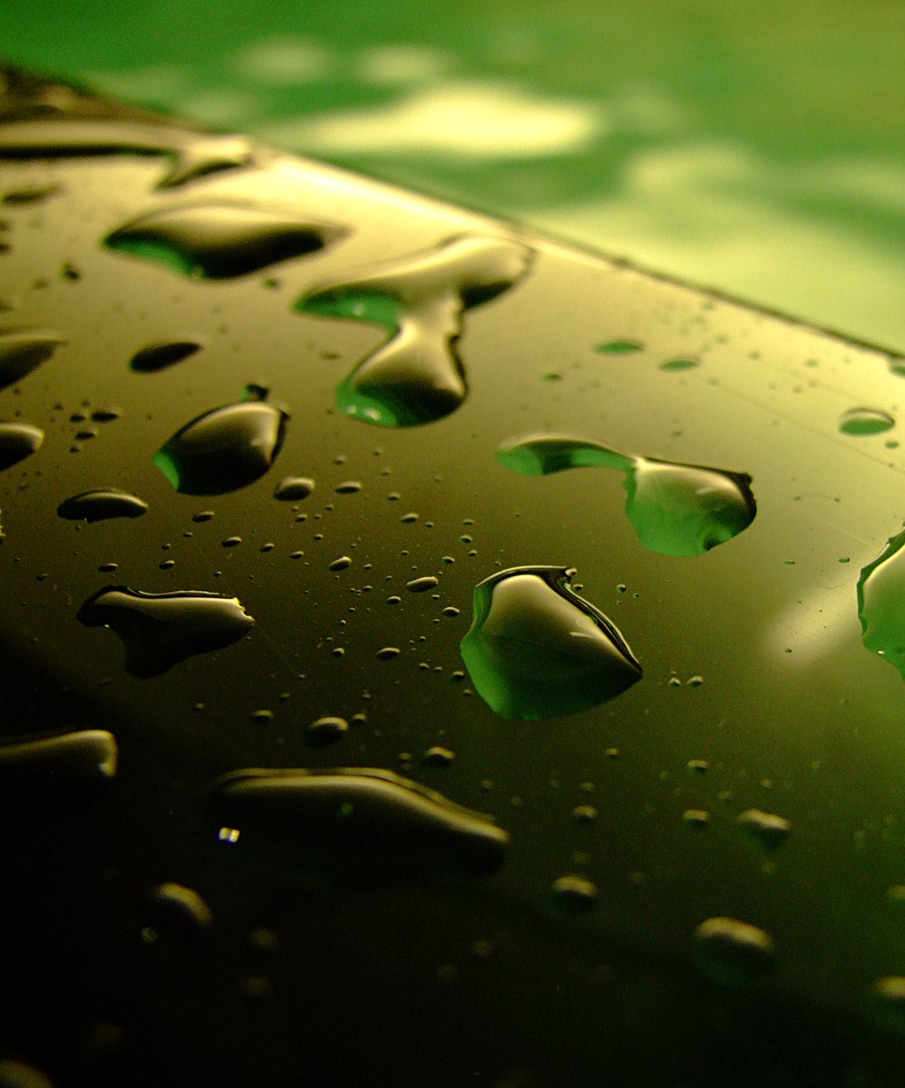 water drops are seen on the surface of a metal surface