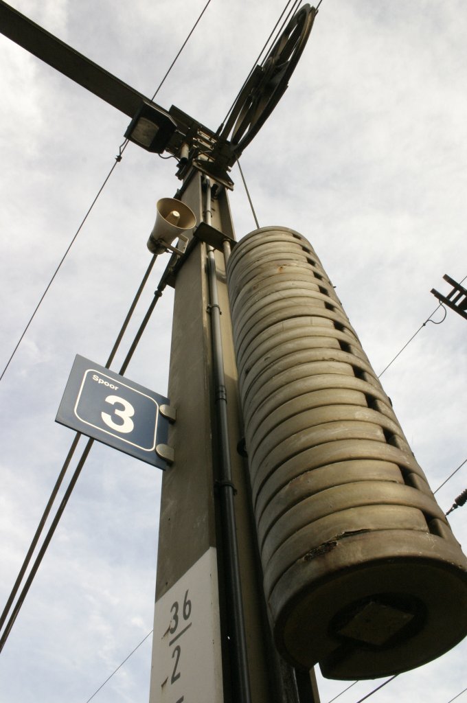 there is an electronic traffic sign hanging off a pole