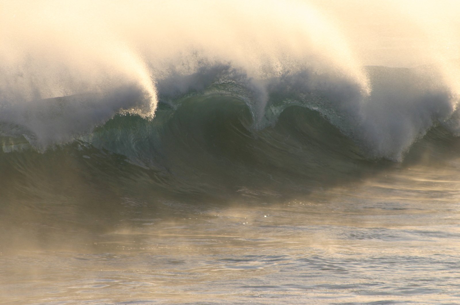 the massive waves are coming in to the water