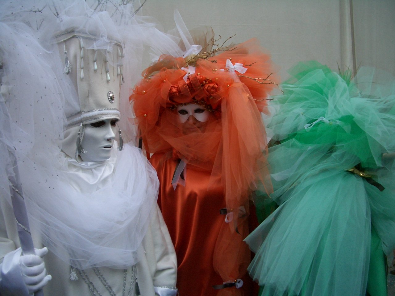 a group of mannequins in dress made to look like costumed people