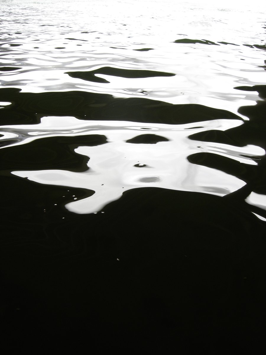 some very pretty water with reflections on it