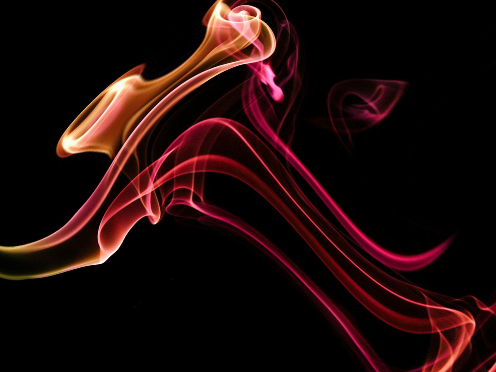 a computer screen showing a blurry line of red and yellow smoke