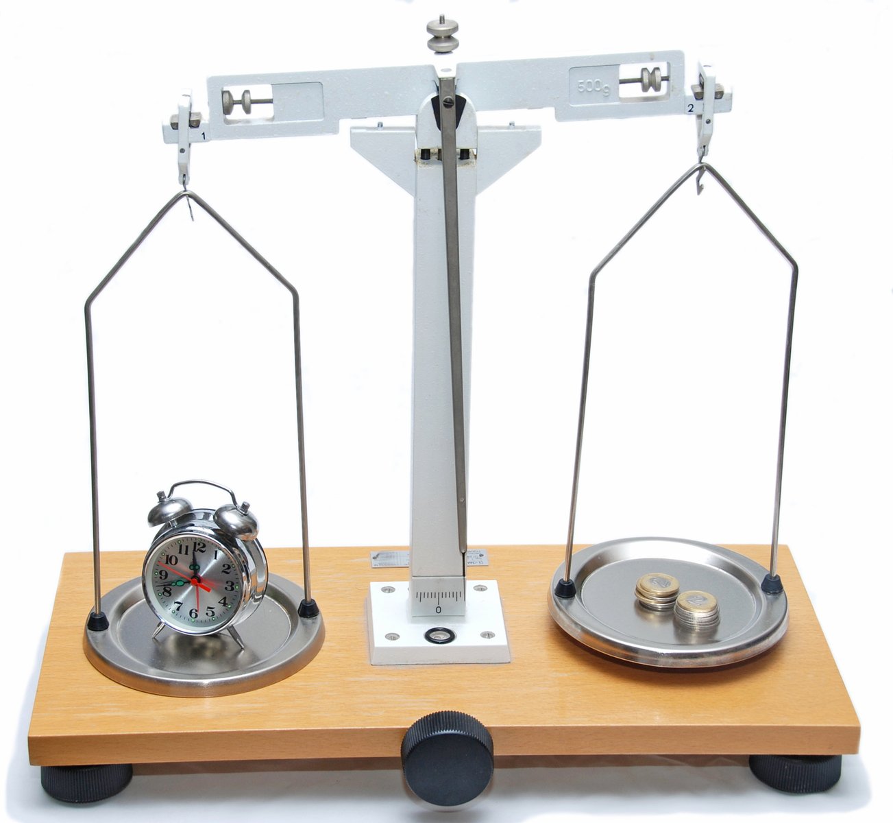 a scale with an alarm and a pendulum on it