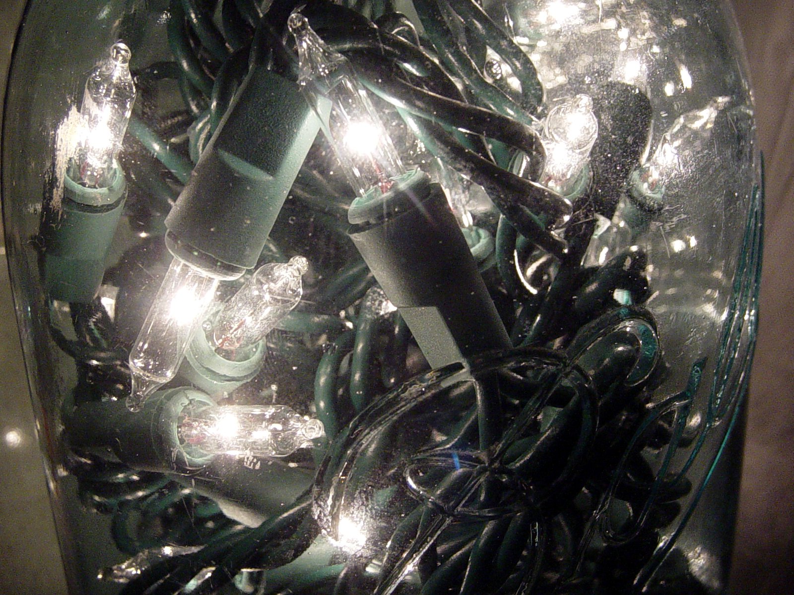 a bunch of light bulbs are placed inside a jar