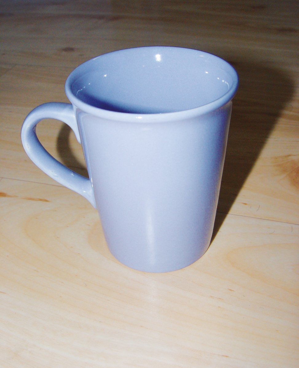 a coffee mug that is on a table