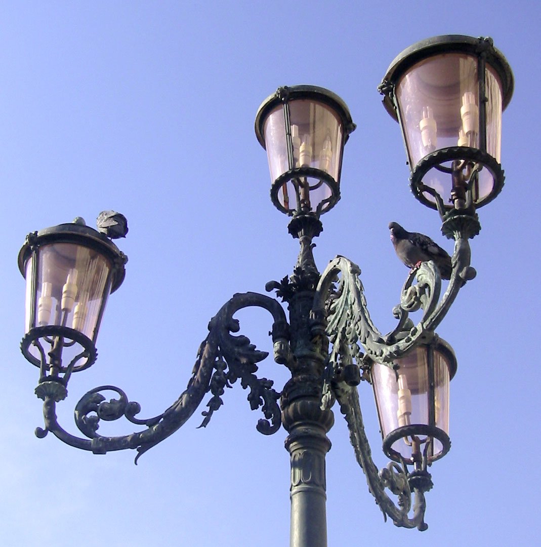 the light post is made from old - fashioned lights