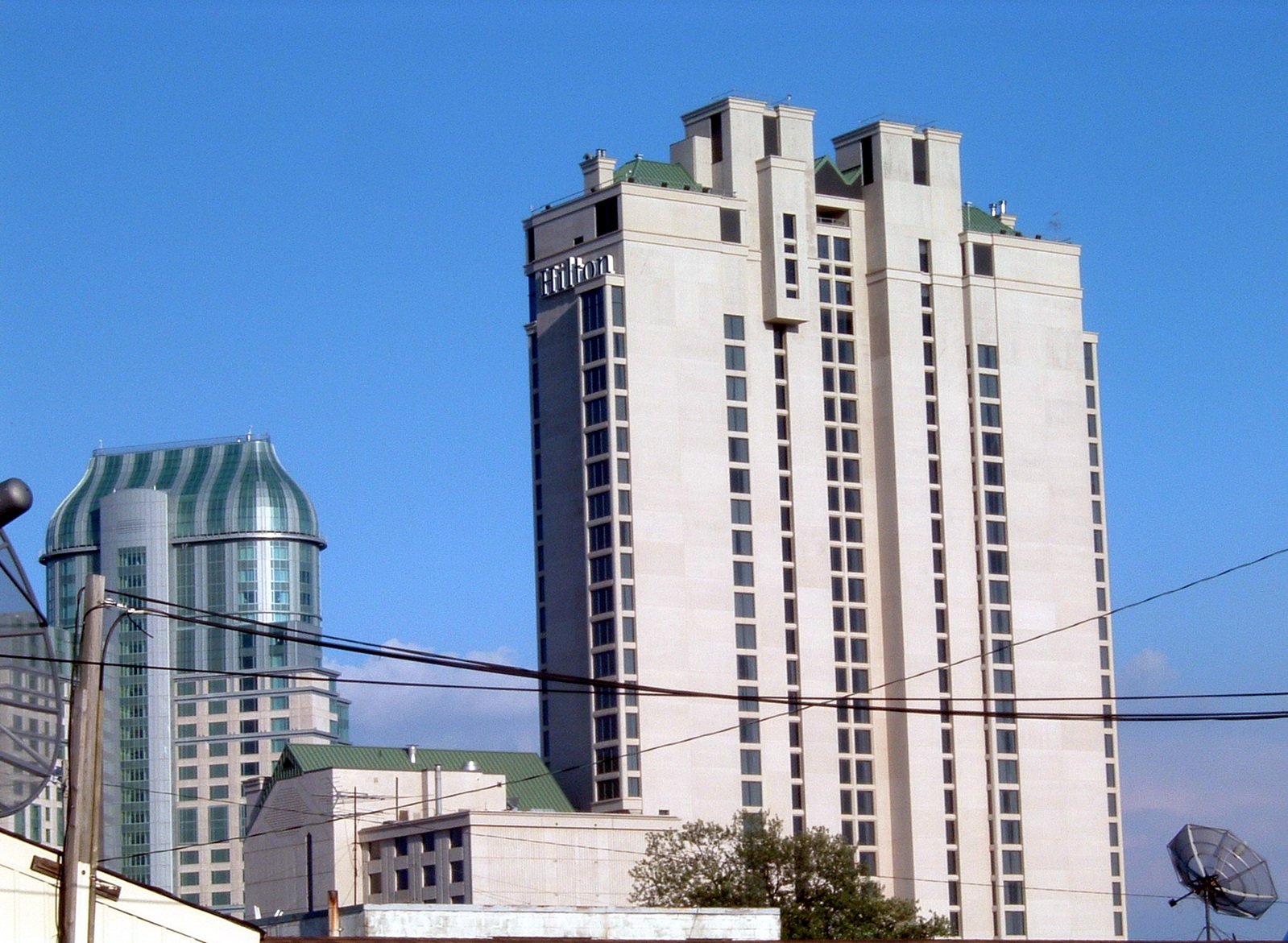 this large high rise building is located near other buildings
