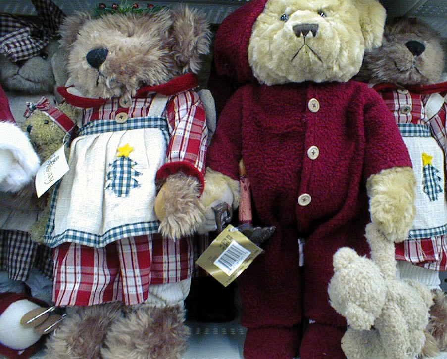 stuffed teddy bears dressed in a red outfit