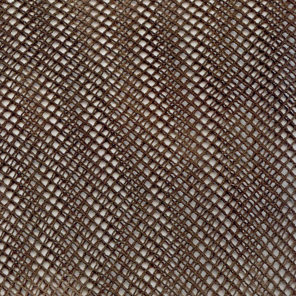 a close up view of an unpaved brown material