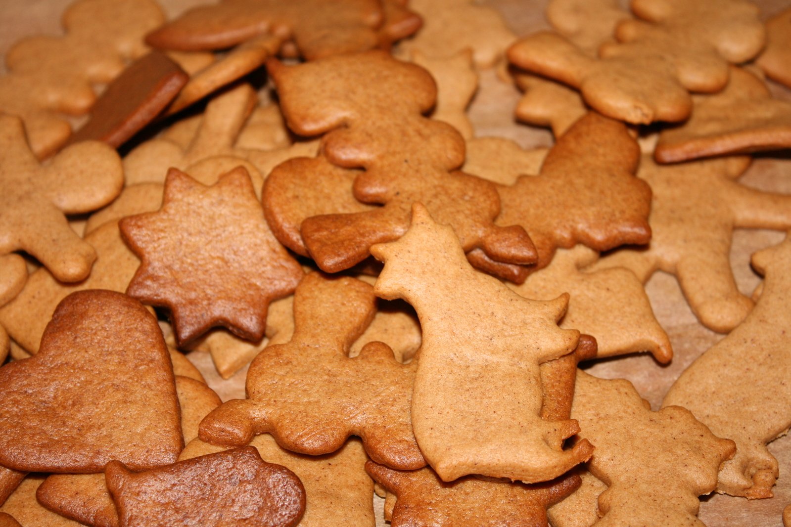 many small cookies shaped like christmas trees