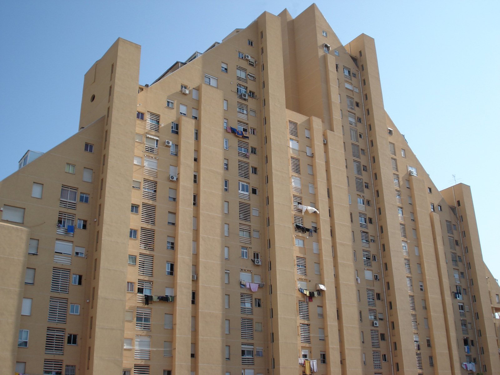 a tall building with many windows on top