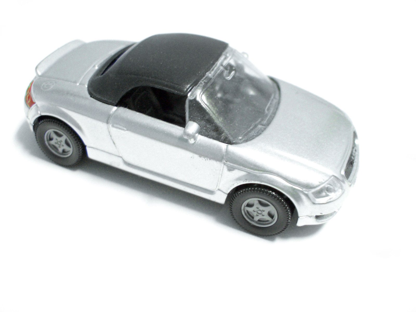 a toy car is shown on the white background