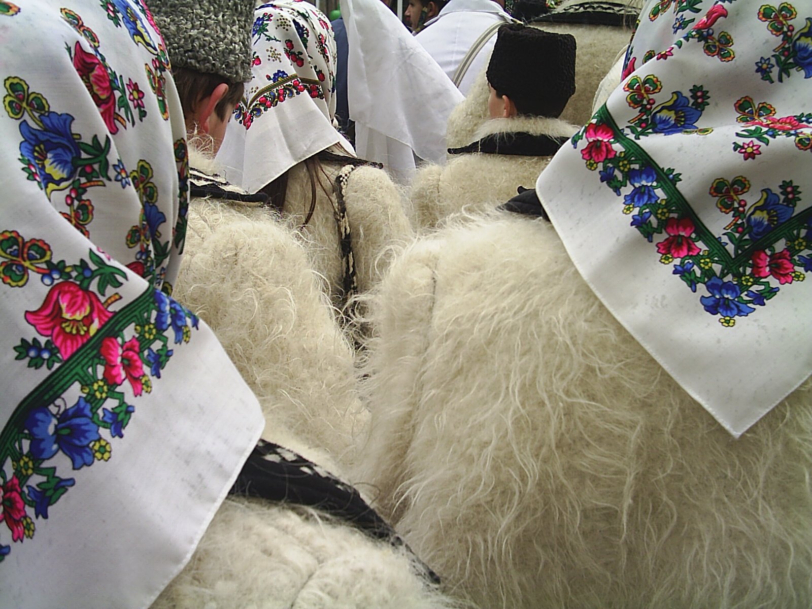 a group of people dressed in a religious program