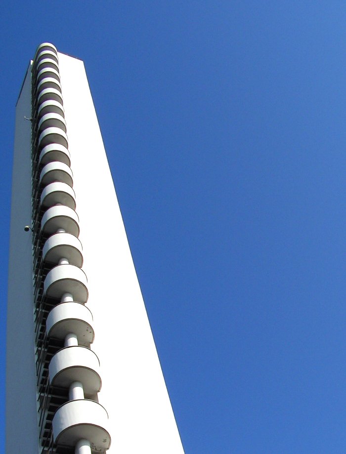 an upward view of an elegantly designed building