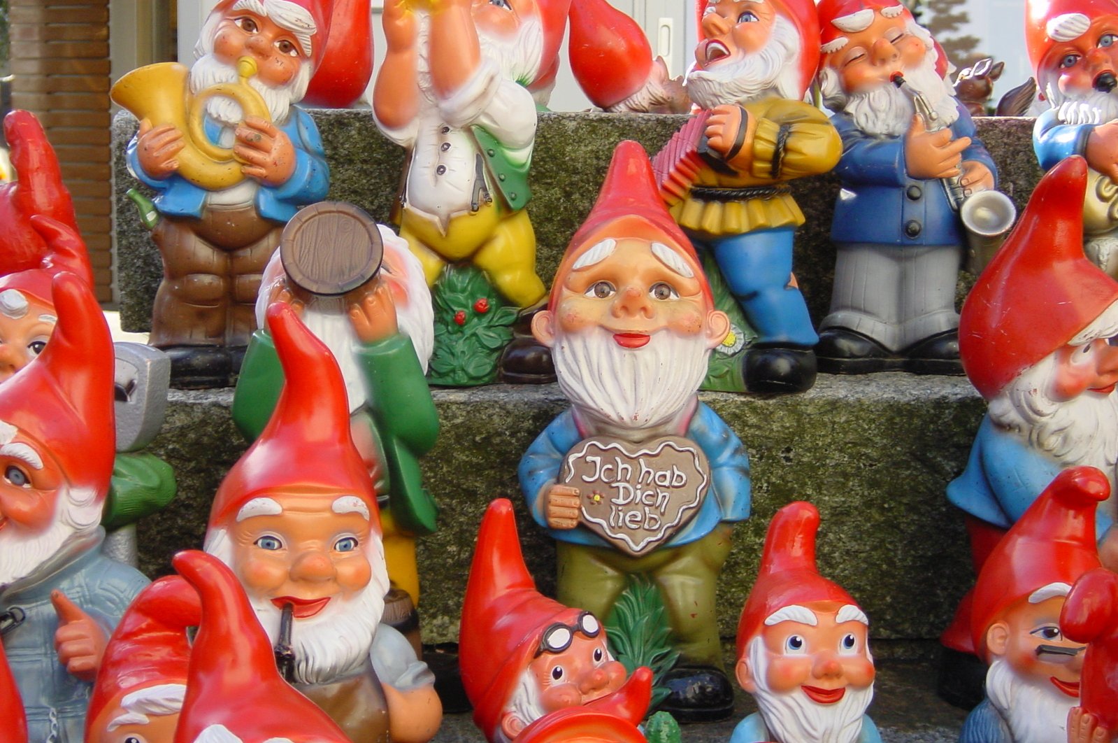 a display of garden gnomes and gnome statues