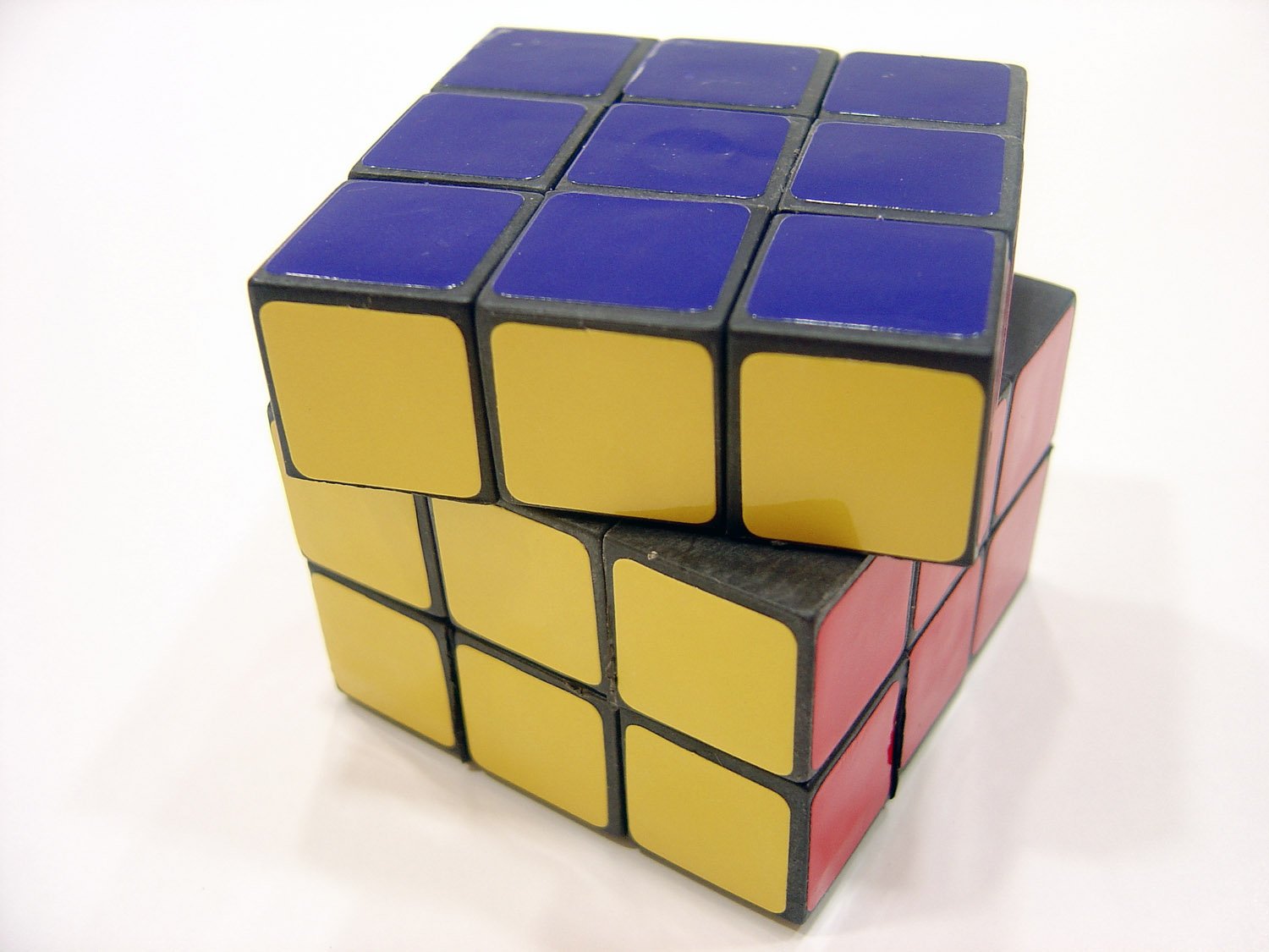 a set of colored cubes stacked up together
