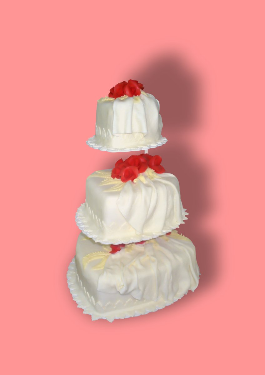 two tiered cakes on white cake plates
